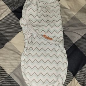 SwaddleMe teal, gray and white newborn swaddler